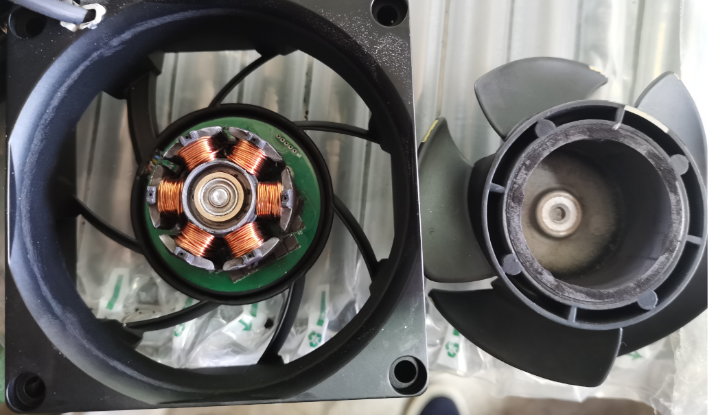 Fan internal construction showing stator coils and rotor with impeller