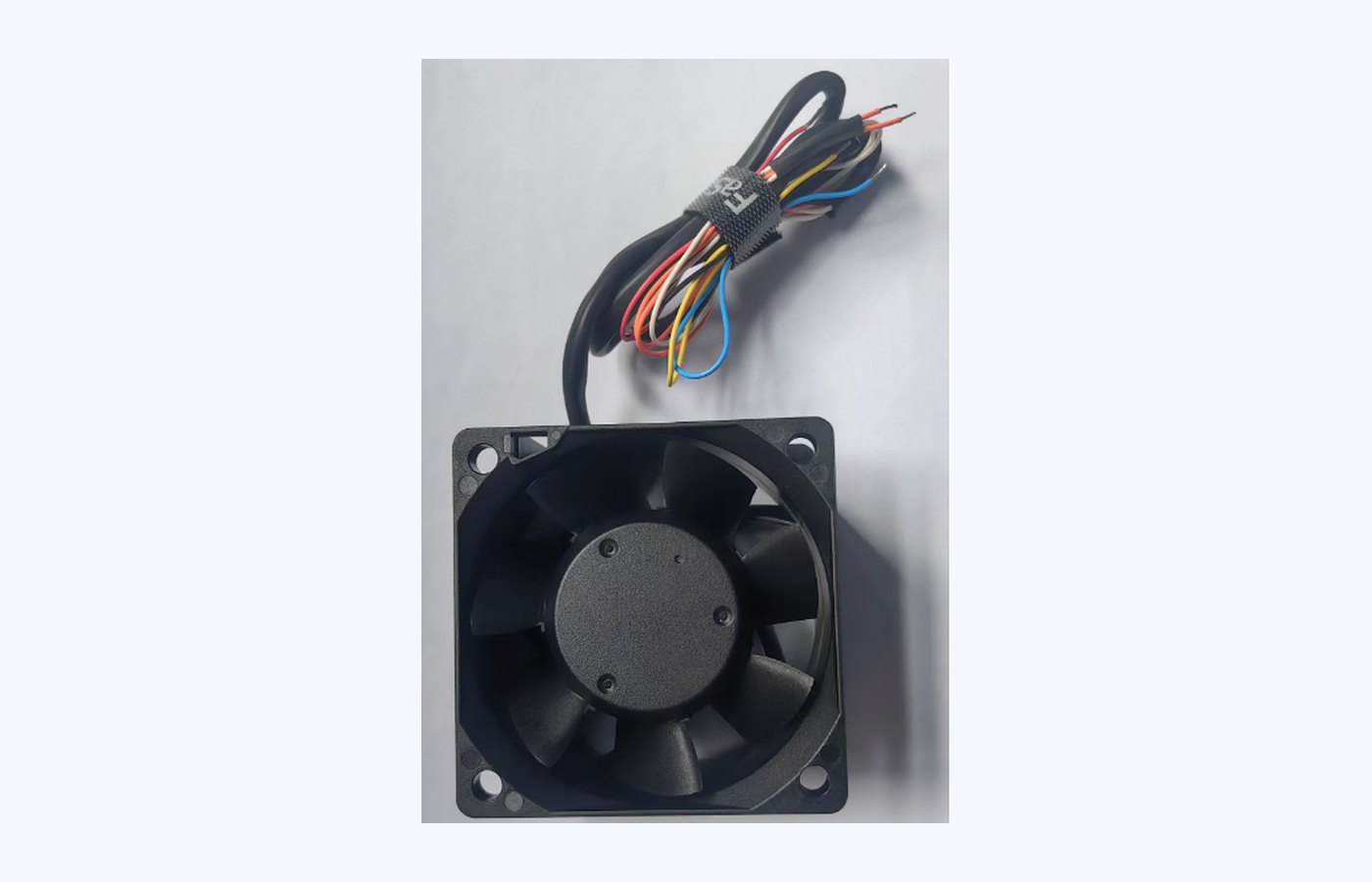 Sealed Perseus axial cooling fan used for harsh-environment electronic cooling applications